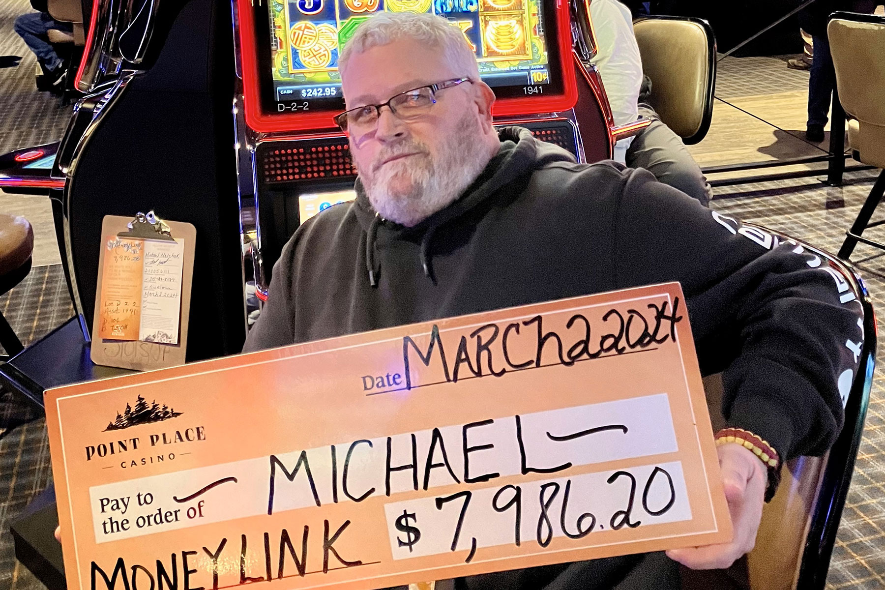 Michael won $7,986