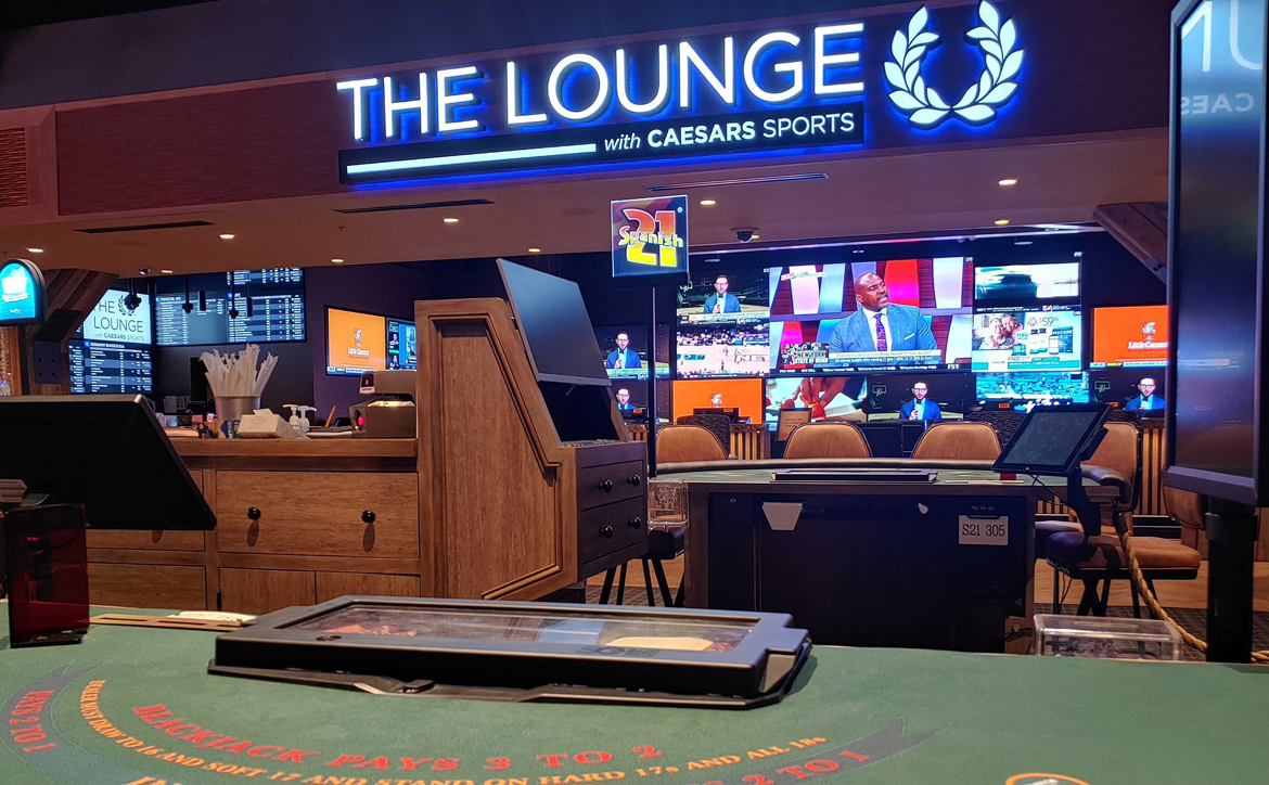 blackjack table outside of The Lounge with Caesars Sports