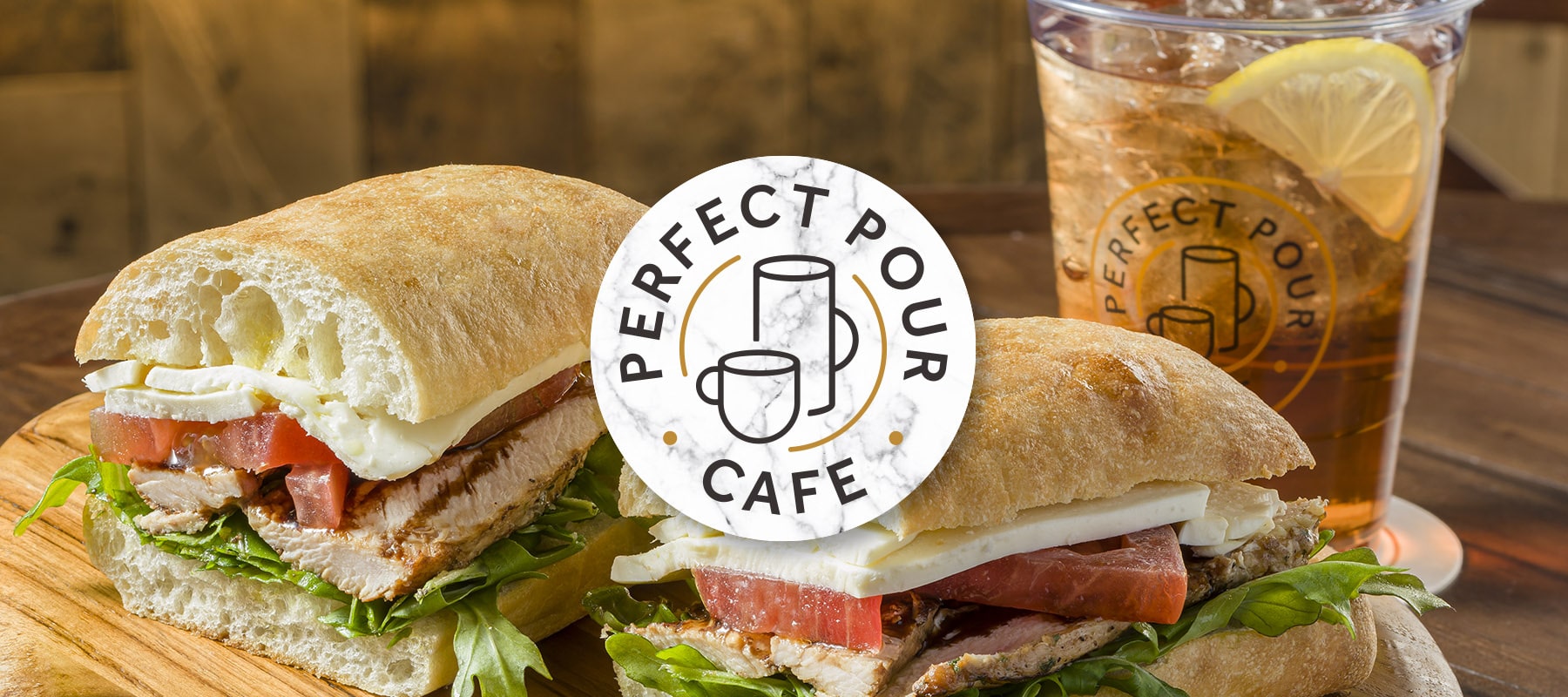 Club sandwich and iced tea with lemon at Perfect Pour Cafe