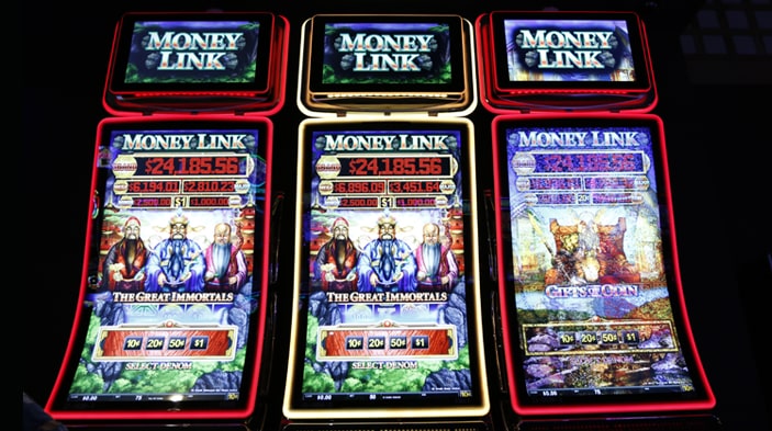 three money link slot machines side by side