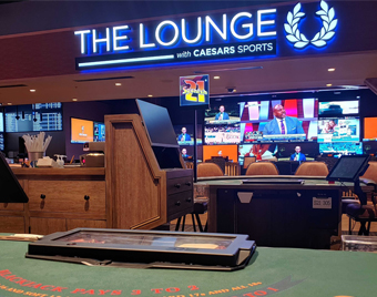 blackjack table outside of The Lounge with Caesars Sports