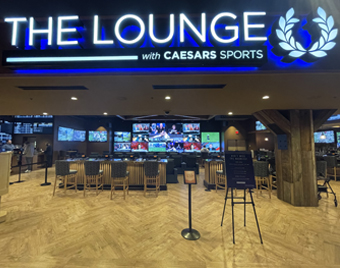 The sports book inside The Lounge with Caesars Sports at Point Place Casino
